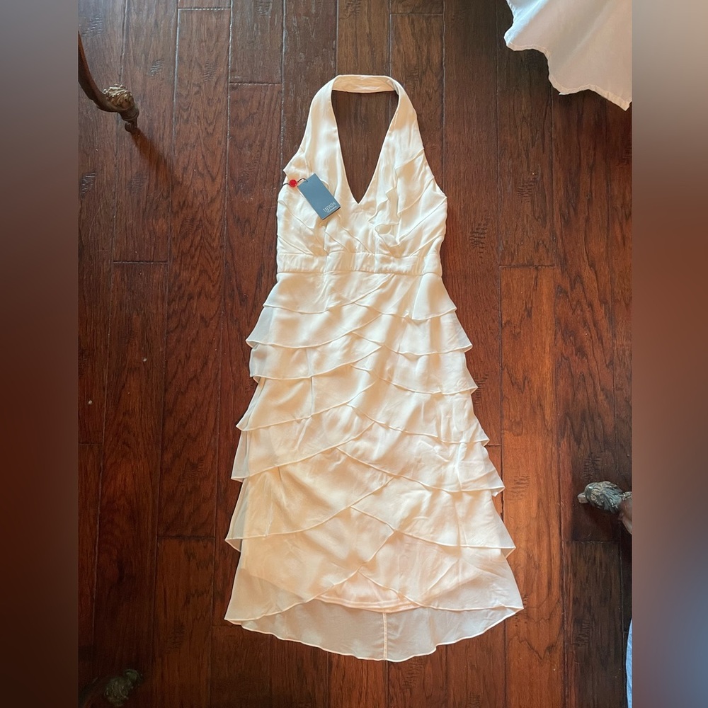 Creamy white ruffled halter dress